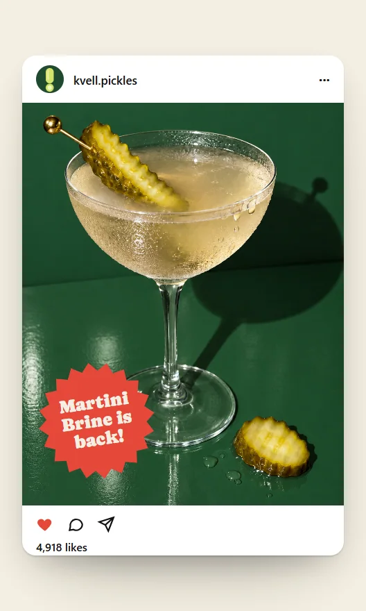 An Instagram post from Kvell: a pickle martini flash-lit on deep green with a tomato-red sticker reading "Martini Brine is back!", with the likes and the caption under it